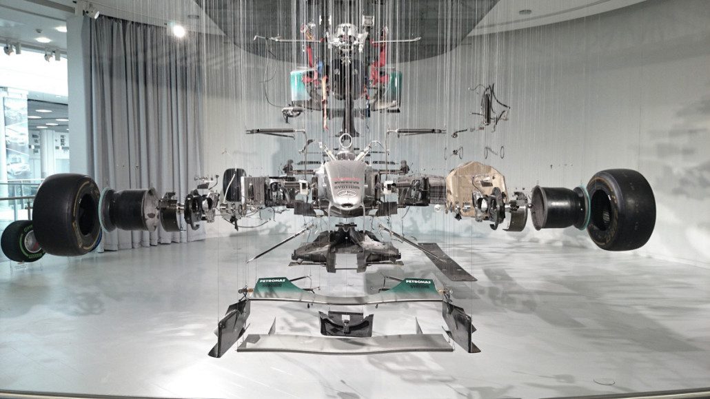 Image of a racing car with components separated - when all of your business capabilities work together, great things happen