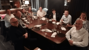 Senior business leaders meet around a table to discuss "Entrepreneurialism in B2B Sales", hosted by Customer Attuned